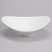 A white Reserve by Libbey oval bowl with a curved edge.