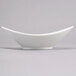 A close up of a white Reserve by Libbey Oval Royal Rideau bowl with a curved edge.