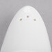 A white Reserve by Libbey Royal Rideau porcelain salt shaker with three holes.
