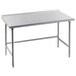 An Advance Tabco stainless steel open base work table with a backsplash.