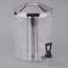 A clear plastic Vollrath cubic beverage dispenser reservoir with a silver lid.