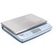 An Edlund BRAVO! digital portion scale with a ClearShield protective cover on the silver tray.
