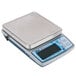 An Edlund BRAVO! digital portion scale with a blue base and clear protective cover.