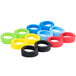 A group of colorful Tablecraft silicone rings with a blue and yellow ring in focus.
