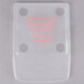 A clear plastic Edlund scale cover with a black and red border and circles with holes in it.