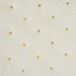 A white fabric with gold dots.