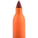 The orange tip of a Sharpie 30006 orange marker.