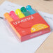 A plastic wrapped box of Universal chisel tip highlighters in fluorescent colors.