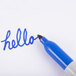 The word "hello" written in blue Sharpie on white paper.