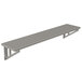 An Advance Tabco stainless steel slotted wall shelf.