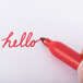 The word "hello" written in red with a Sharpie fine point marker.