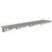 A grey metal Advance Tabco wall shelf with long slotted shelves.