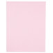 A white rectangular object with pink paper inside.