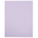 A white rectangular object with a purple border containing orchid colored paper.