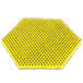 A yellow and black Scotch Brite sponge pad with a hexagonal pattern.