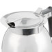 A Thunder Group stainless steel coffee decanter with a black handle and lid.