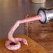 A sausage being made with a Weston Pro Series Electric Meat Grinder.