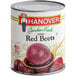 A can of Hanover Whole Red Beets with a label on it.