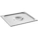 A Vigor stainless steel steam table pan cover on a stainless steel tray.