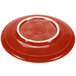 A red Fiesta saucer with a white rim.