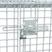 A white MetroMax Q mobile security unit cage with a lock.