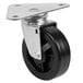A set of four black Blodgett swivel plate casters with black wheels.