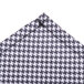 A white cloth with a black houndstooth pattern.