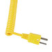 A Taylor 9818 yellow spiral cable with a yellow plug.