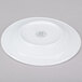 A CAC Roosevelt super white porcelain plate with a circular rim.