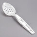 A white plastic spoon with holes.