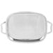 A Vollrath stainless steel oblong serving tray with handles.