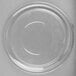 A clear plastic Sabert dome lid on a white surface.