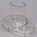 A clear plastic lid for a Waring commercial food processor.