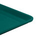 A teal plastic Cambro dietary tray with a black border.