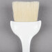 A white Winco pastry/basting brush with a white handle.
