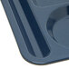 A Carlisle blue melamine tray with 6 compartments.