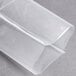 A clear plastic wrapper of ARY VacMaster chamber vacuum packaging pouches on a grey surface.