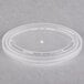 A clear plastic lid with a white oval.