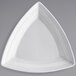 A white triangle shaped Tuxton Concentrix china plate.