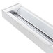 A rectangular stainless steel metal box with a long thin metal strip inside.