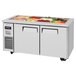 A Turbo Air refrigerated buffet table with a variety of vegetables on display.