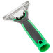 A Unger ErgoTec XL squeegee handle with a green handle.