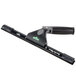A black Unger window squeegee with a green and black ErgoTec handle.