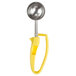 A yellow and silver Zeroll ice cream scoop with a yellow plastic handle.