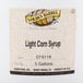 A label for Golden Barrel Light Corn Syrup on a white surface.