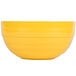 A Vollrath yellow double wall round beehive bowl.