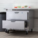 A Beverage-Air stainless steel undercounter refrigerator with 2 drawers.