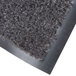 A gray carpet roll with a black border.
