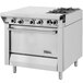 A large stainless steel Garland gas range with four burners.