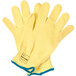 A pair of yellow Cordova cut resistant gloves with blue trim.